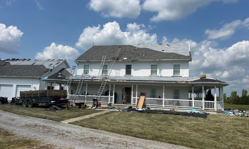 20240824_171015516_iOS sunny day with a large roof partially completed west jefferson ohio certainteed shingles