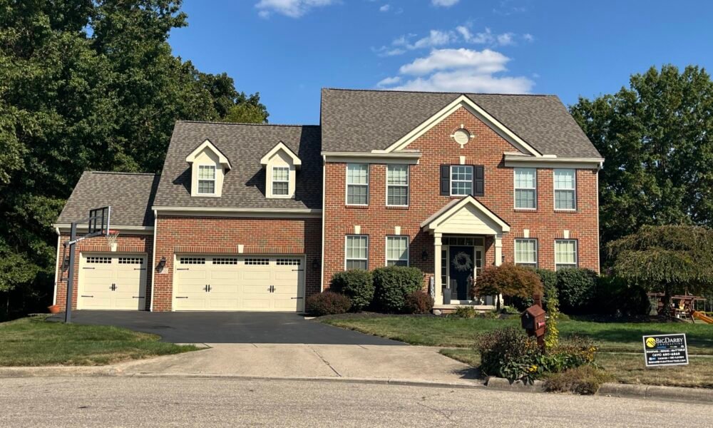 IMG_6513 front of the home tan home with new tan siding new brown roof galloway ohio royal building products siding